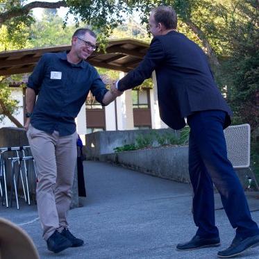 Corey at a recognition event for faculty