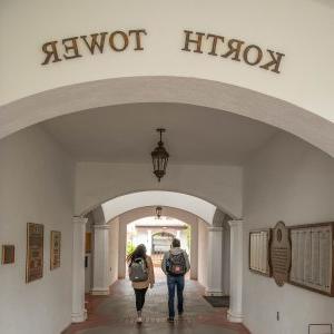 Students walk through corridor